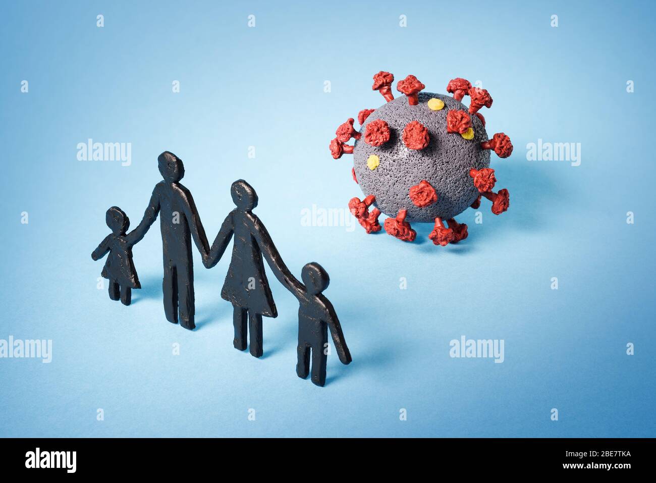 Family facing the threat of coronavirus infection. COVID-19 pandemic. Social distancing concept Stock Photo