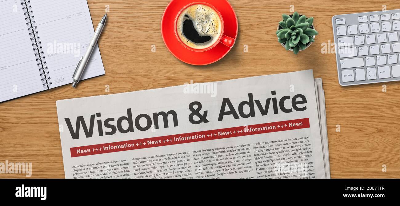 Newspaper on a desk -  Wisdom and Advice Stock Photo