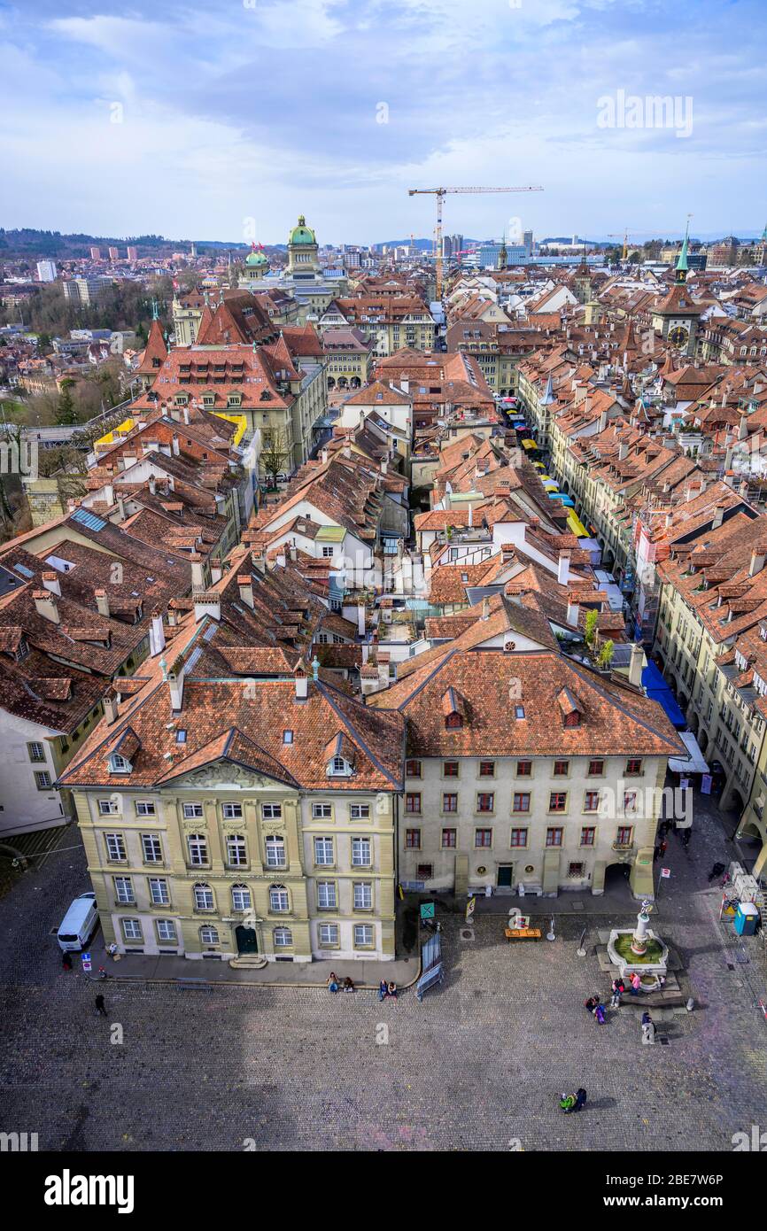 View from the Bernese Minster to the Muensterplatz and the red tiled roofs of the houses in the historic centre of the old town, City view, Inner Stock Photo