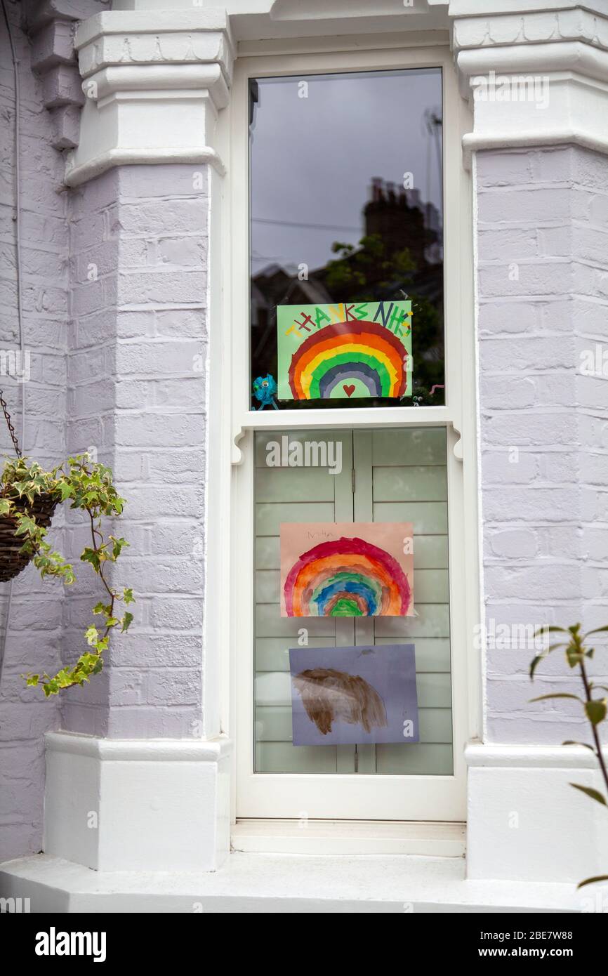 Rainbow Drawings in Window as Thanks to NHS Staff, Coronavirus 2020 Stock Photo