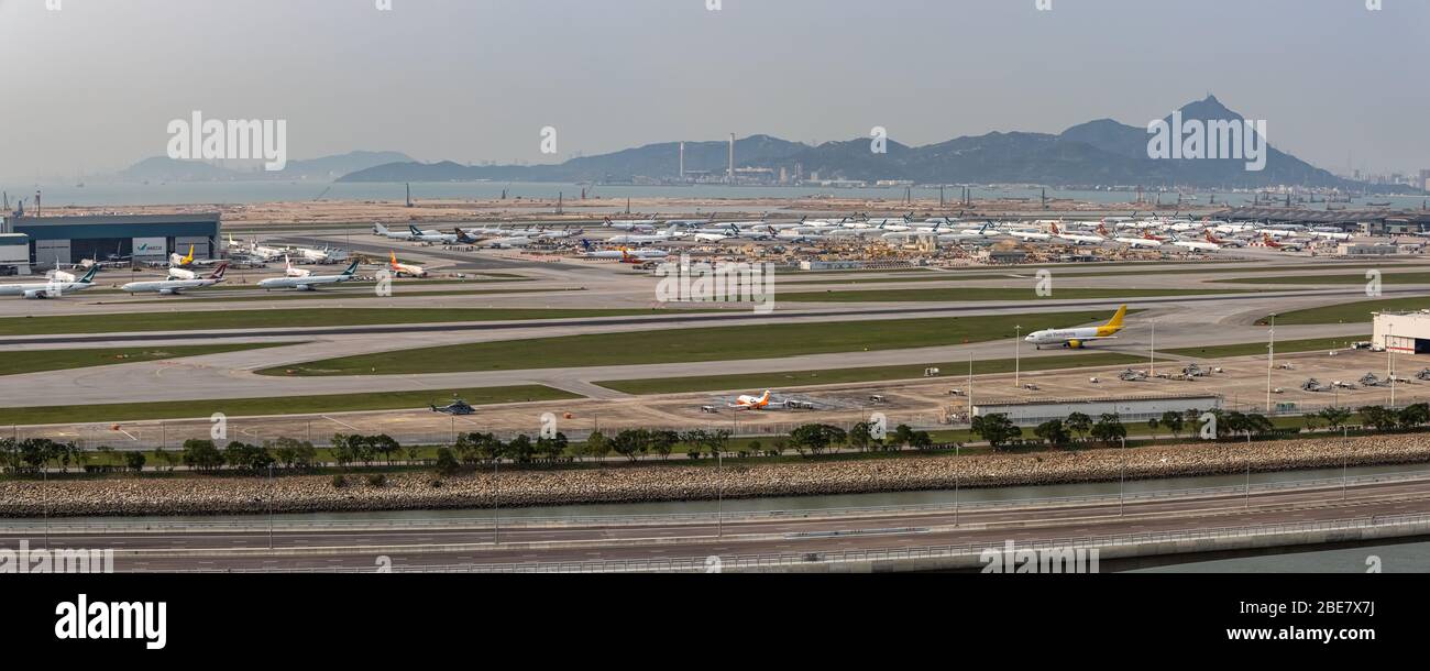 Lantau, Hong Kong  - April 10, 2020 :  Inside view of airport at runway, all parking space is fully occupied because of travel alert Stock Photo