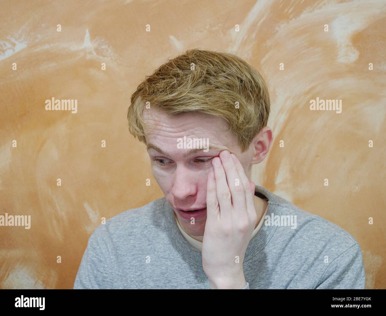 A shocked or confused man looking into the camera Stock Photo