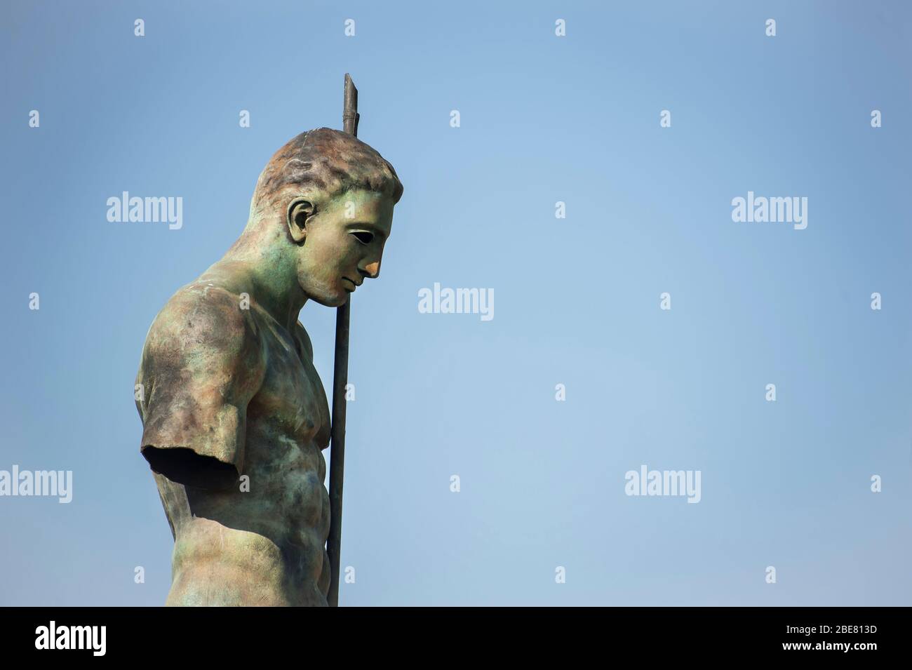 Bronze warrior statue by Igor Mitoraj during an exhibition in the ancient city of Pompeii, Italy Stock Photo