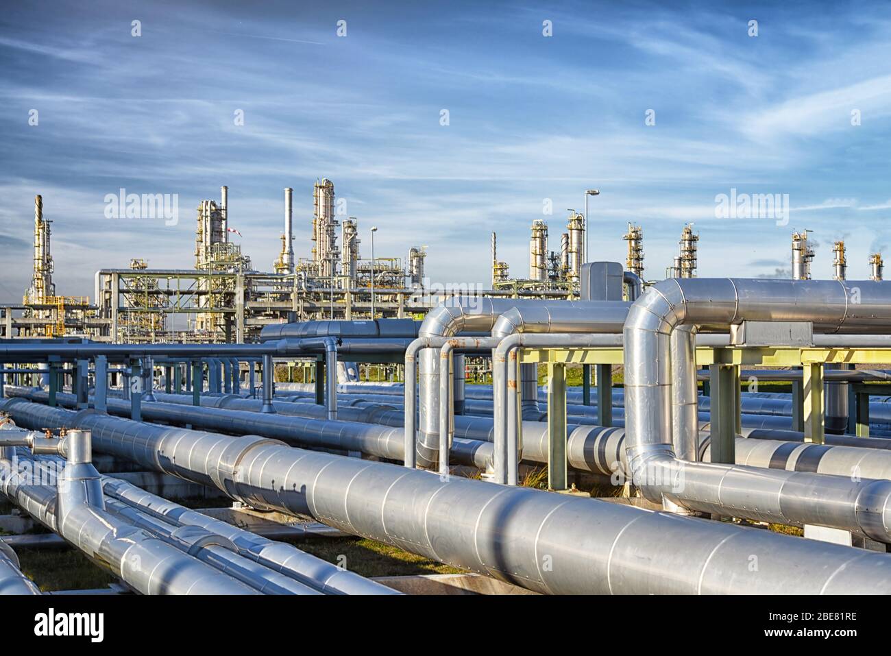 transport of crude oil to a refinery - pipelines and buildings of a chemical factory Stock Photo
