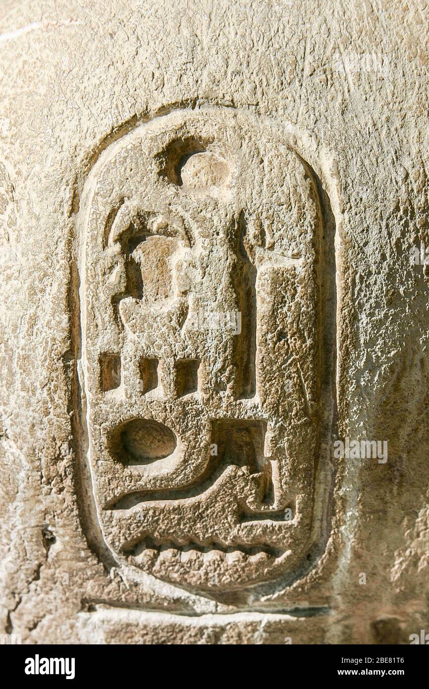 Egypt, Cairo, Heliopolis, open air museum, obelisk parc.  Statue of the king Sethy II presenting an offering table : Cartouche of the king. Stock Photo