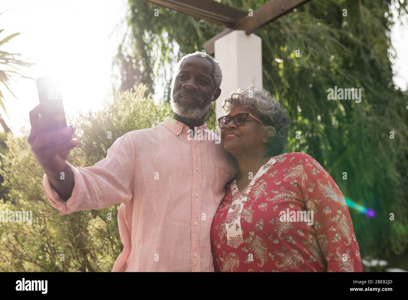 An African American couple spending time together and taking a picture Stock Photo