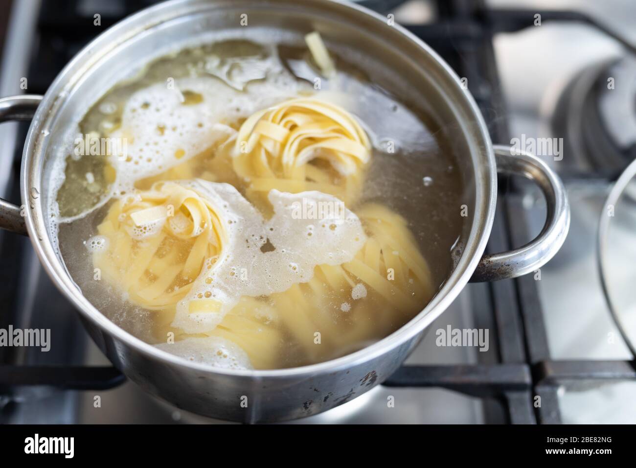 Boiling pasta hires stock photography and images Alamy