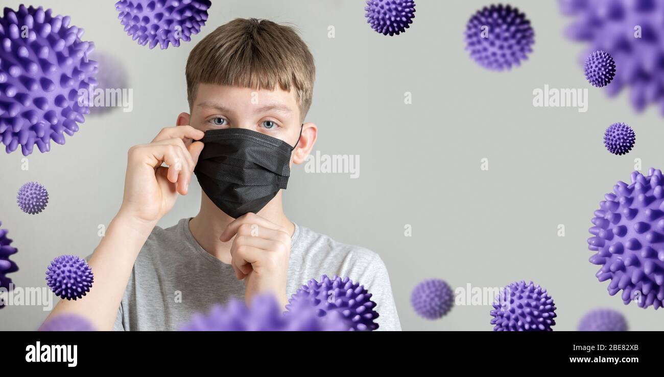 Teenager puts mask hi-res stock photography and images - Alamy