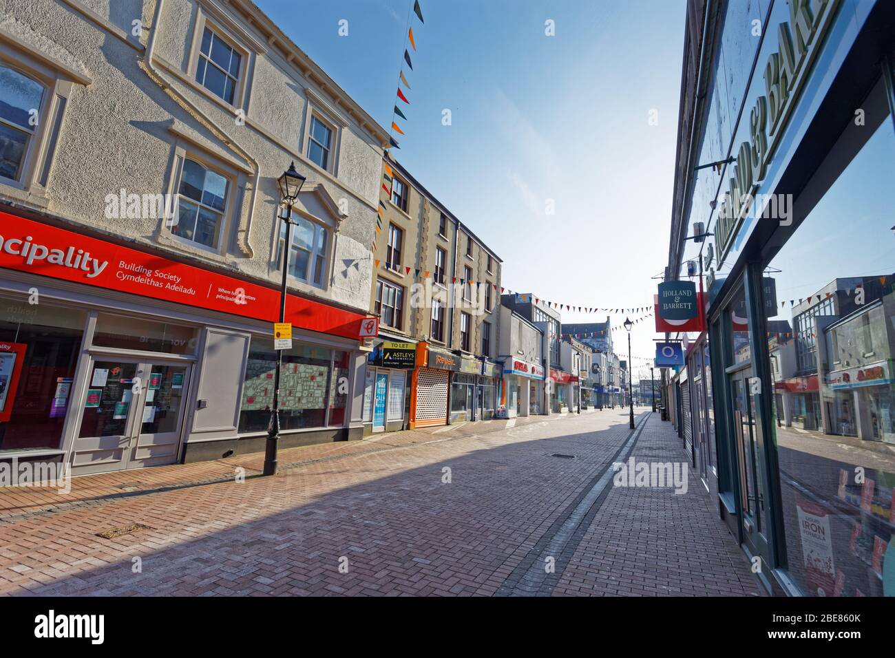 Pictured: The deserted Green Street in Neath city centre, Wales, UK. Friday 27 March 2020 Re: Covid-19 Coronavirus pandemic, UK. Stock Photo