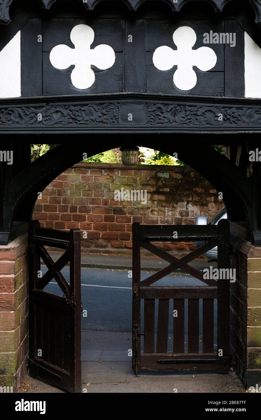 The front gate entrance of Where the St Peters Church in Woolton Village Liverpool. Where John Lennon and Paul Mccartney first played together Stock Photo