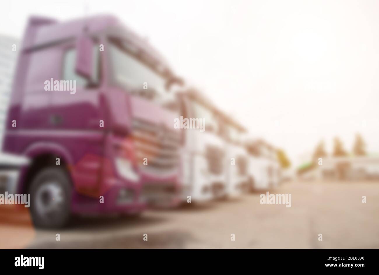 Truckers in the parking lot. The concept of roadside services for the recreation and parking of truckers, blurred Stock Photo
