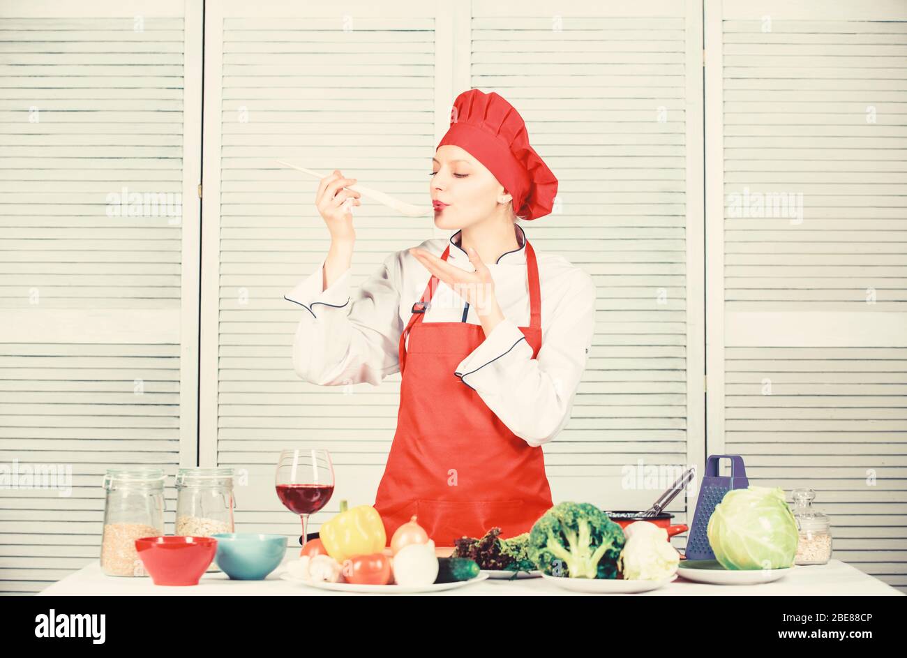 Organic Eating And Vegetarian Housewife Professional Chef In Kitchen Restaurant Menu Dieting Woman In Cook Hat And Apron Happy Woman Cooking Healthy Food By Recipe Nutrition Value Stock Photo 352994790 Alamy