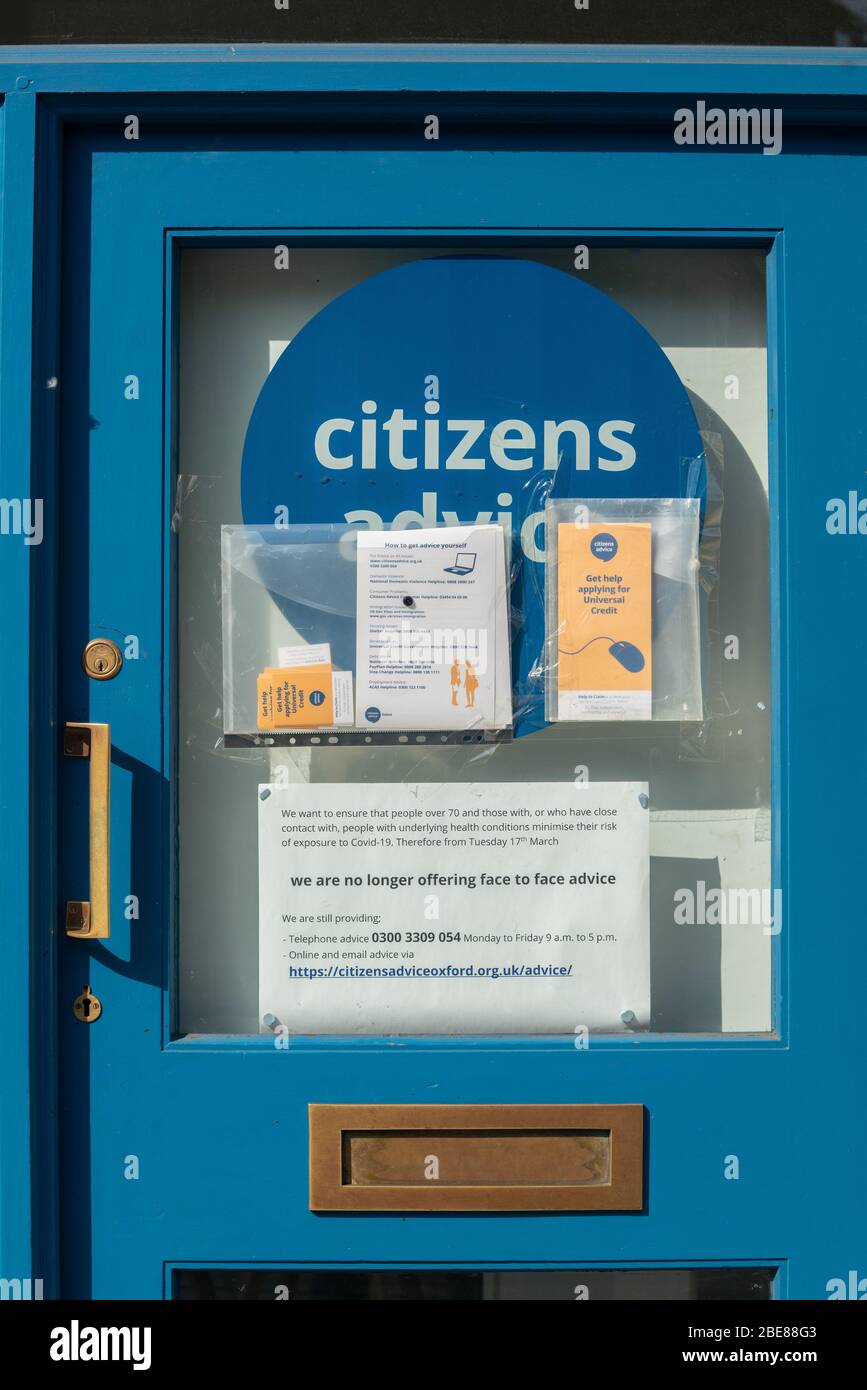 Notes taped onto the entrance of the Citizens Advice Bureau, Oxford, UK, Closed due to the UK lockdown. Coronavirus. Stock Photo