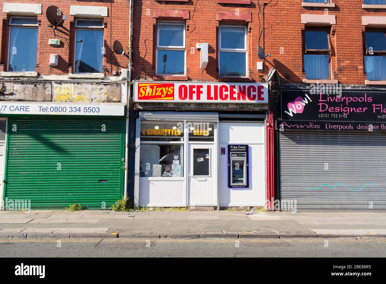 Shuttered shops on Wavertree High Street, a main artery into liverpool city centre, Liverpool, England. Stock Photo