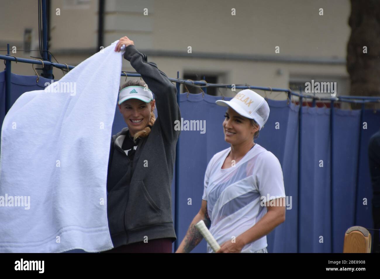Bethanie Mattek Sands of America talking to Caroline Wozniacki of Denmark, women’s tennis players at Eastbourne Tennis on the 24th June 2019 Stock Photo