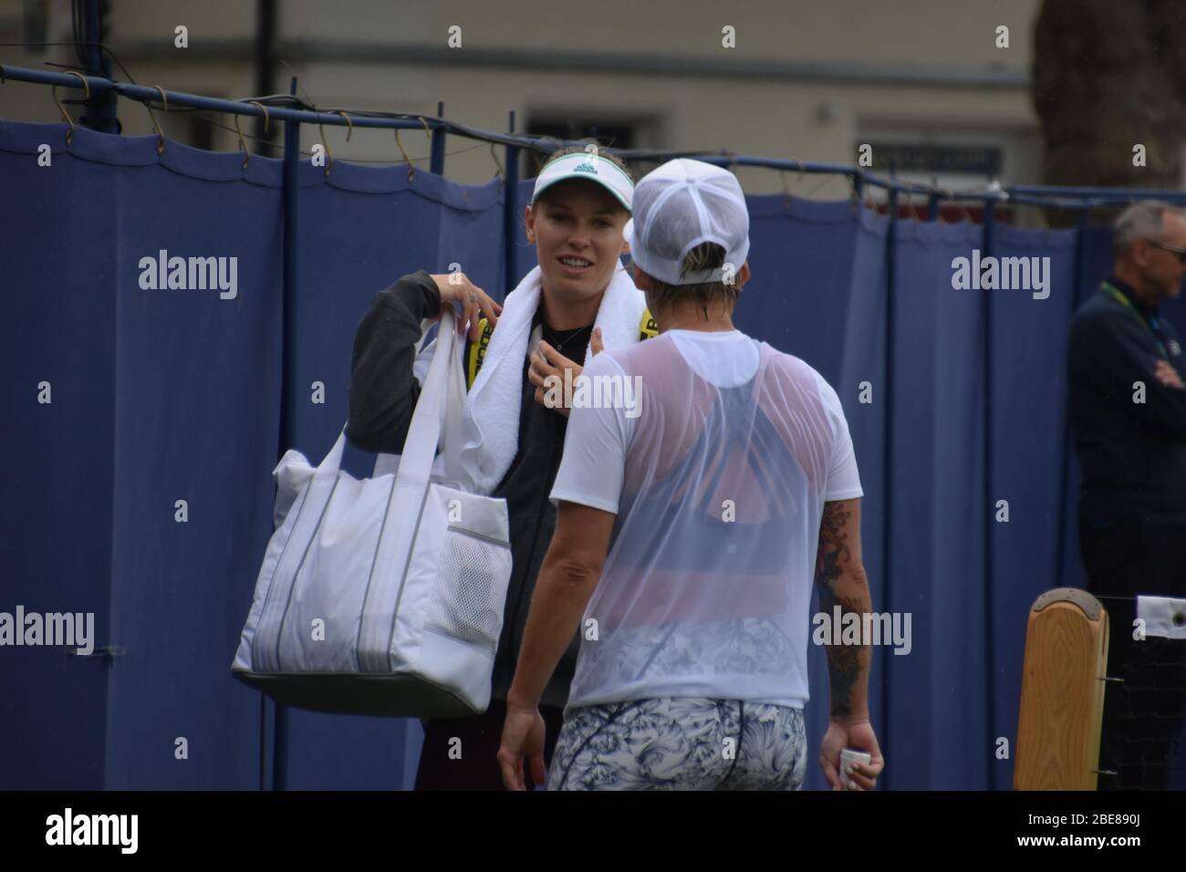Bethanie Mattek Sands of America talking to Caroline Wozniacki of Denmark, women’s tennis players at Eastbourne Tennis on the 24th June 2019, UK Stock Photo