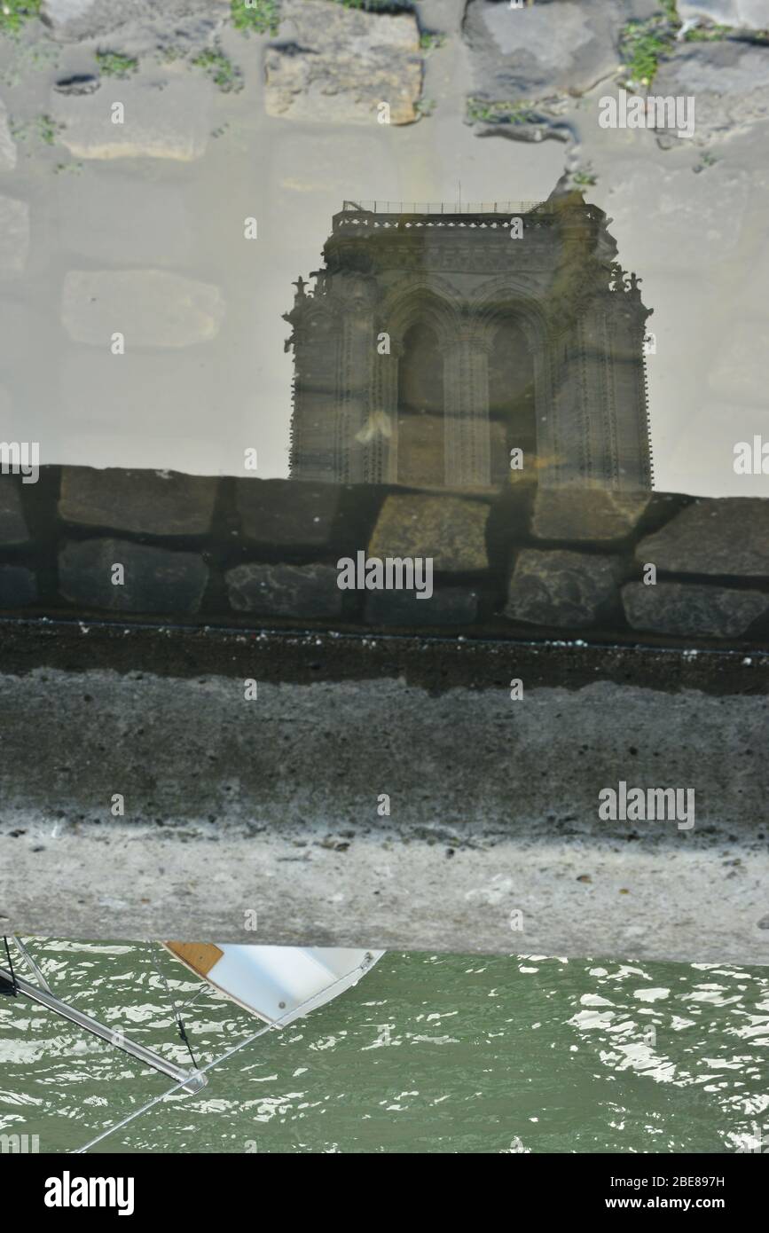 Reflection on water : a different view of Notre-dame Stock Photo