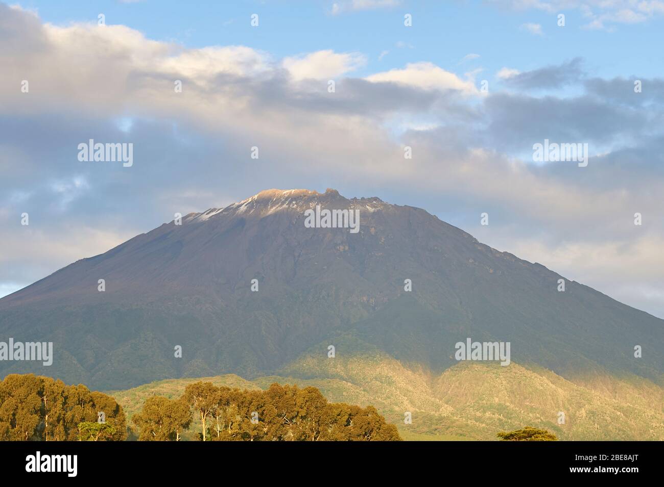 A rare view, snow on Mt Meru (Tanzania) Stock Photo