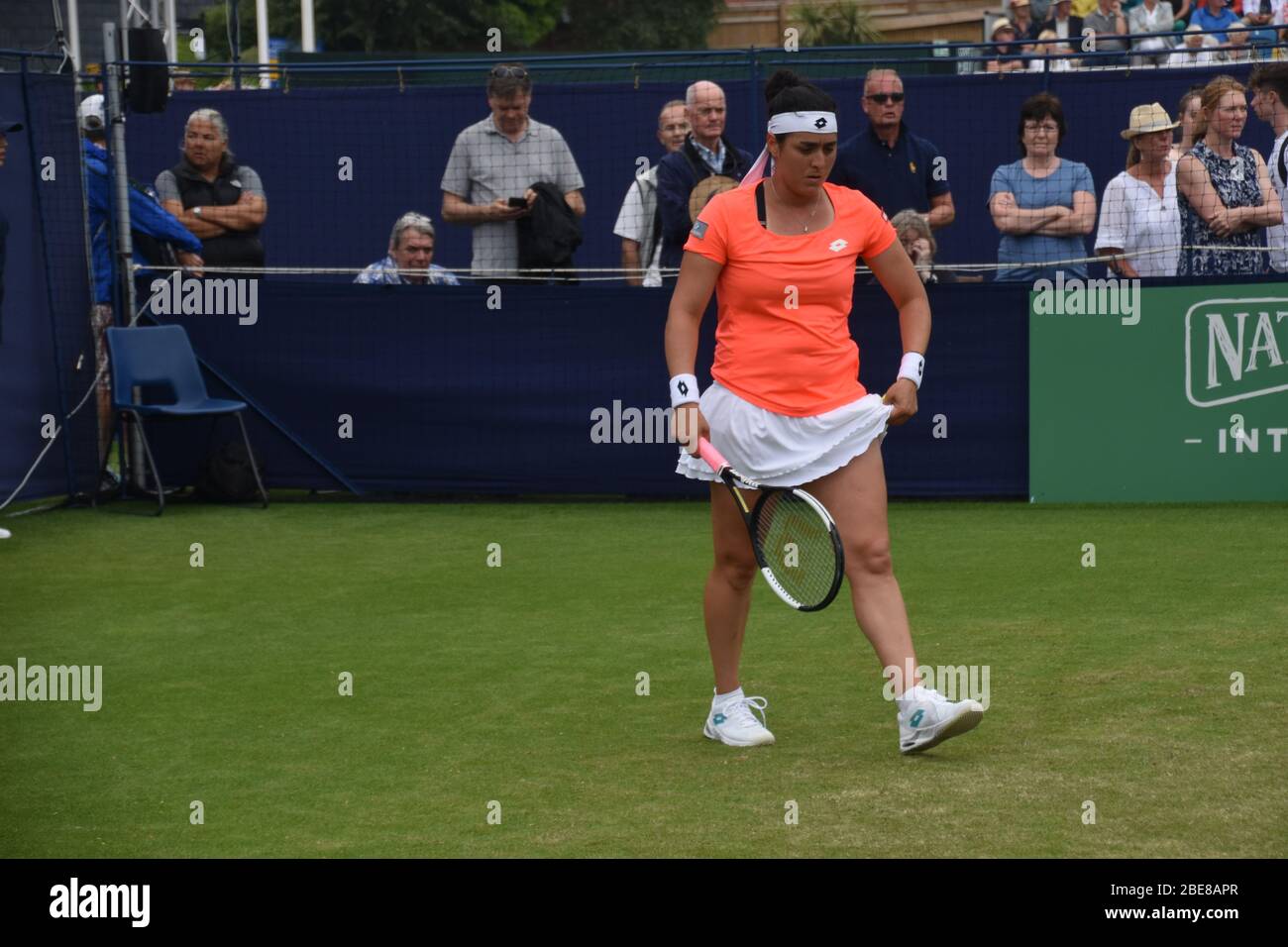 Ons Jabeur the Tunisian female tennis player, playing a women’s tennis match at Devonshire Park, Eastbourne in 2019 Stock Photo