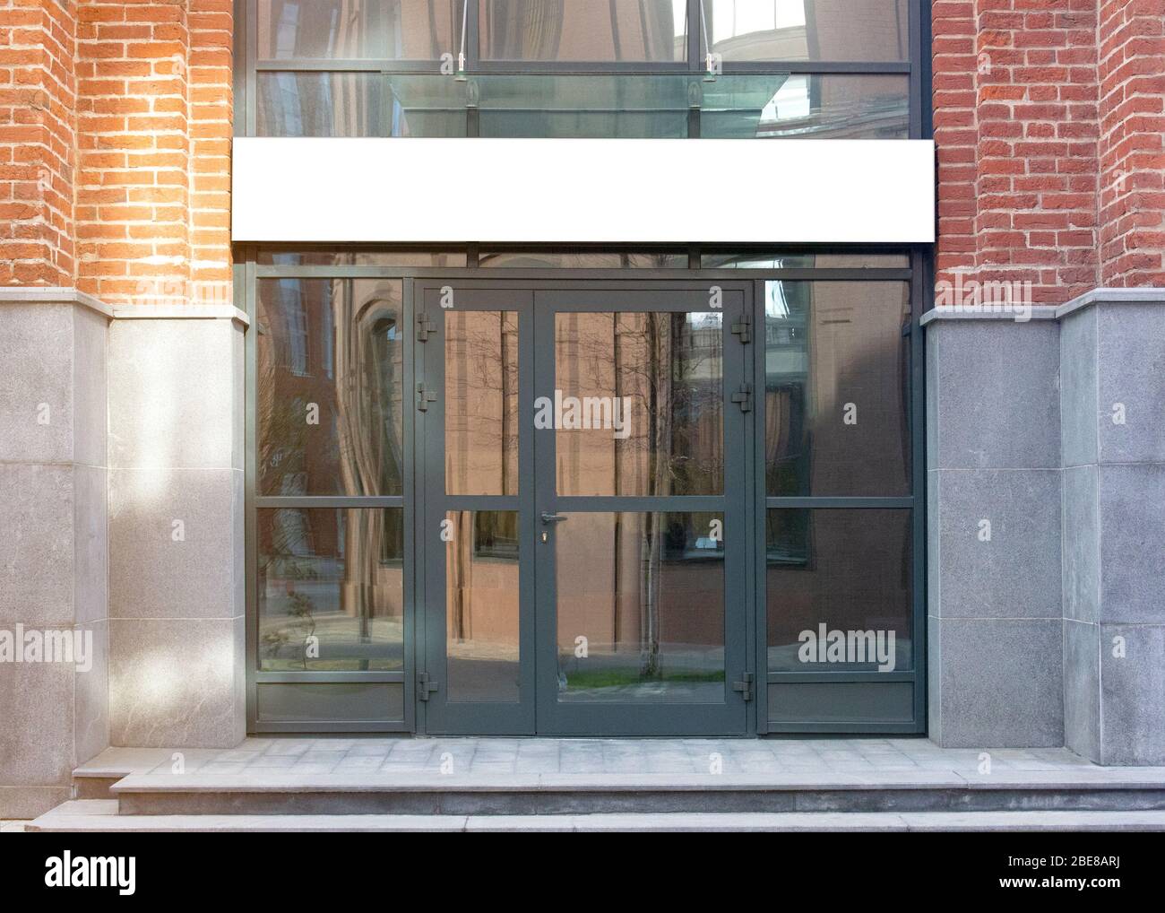 Blank white rectangular box store entrance mockup, glass brick wall Stock  Photo - Alamy, image size:1300x1018