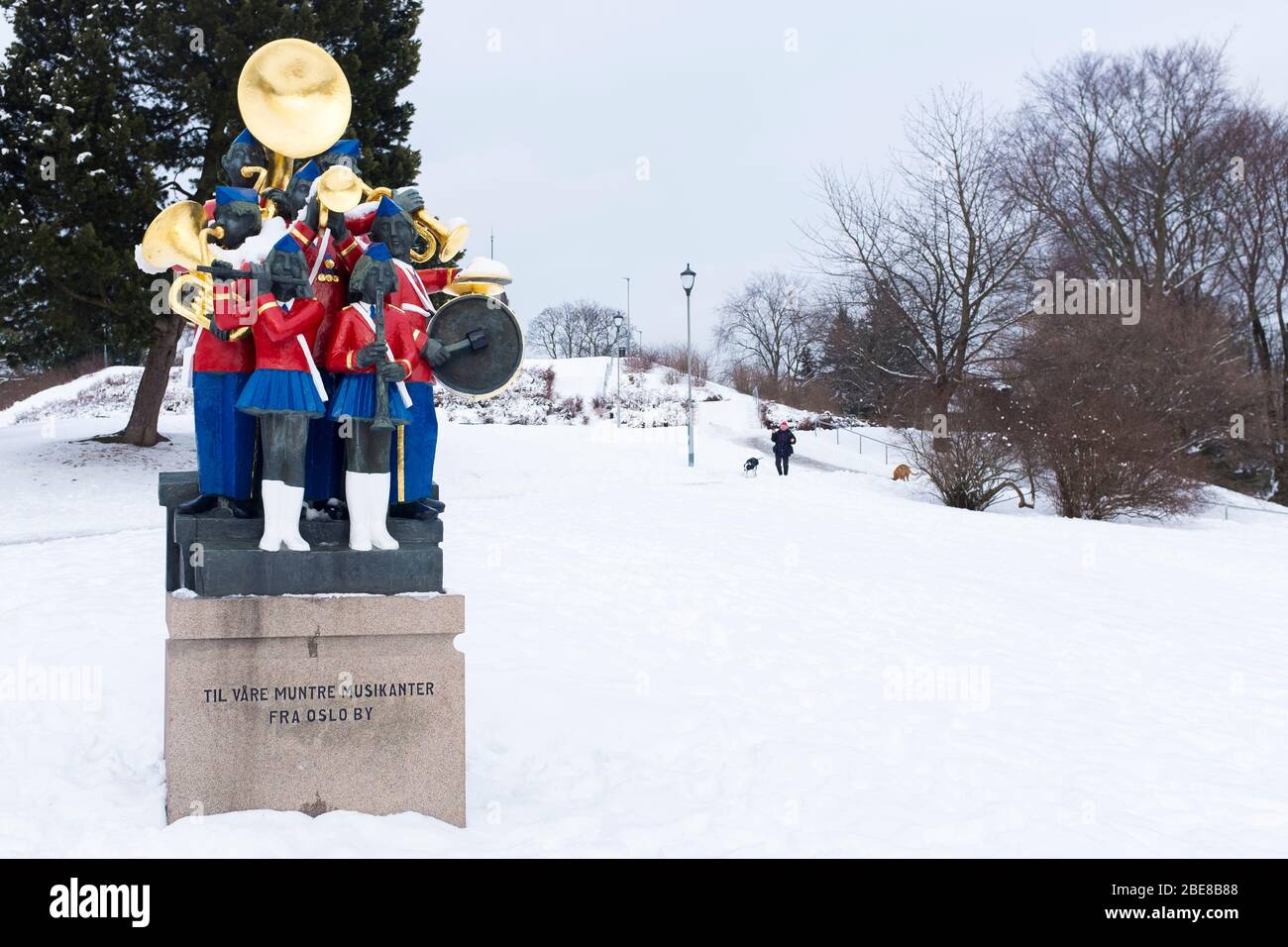 A statue depicting coloured musicians playing in a brass band as snow blankets St. Hanshaugen park in central Oslo, Norway. Stock Photo