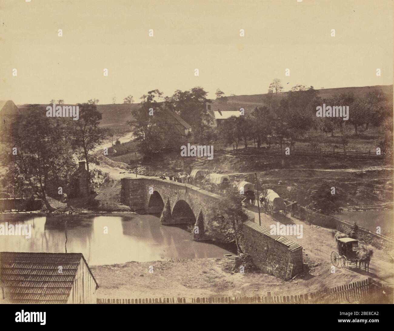 'English: Burnside's Bridge (Antietam Bridge), near Antietam, Maryland, in autumn 1862.  Site of the 'afternoon battle' of the Sept. 1862 Battle of Antietam. The caption on the original says ALEX. GARDNER, Photographer, Entered according to act of Congress, in the year 1866, by A. Gardner, in the Clerk's Office of the District Court of the District of Columbia. 511 Seventh Street, Washington. The previous page says:  Antietam Bridge, Maryland.   This structure crosses Antietam Creek on the turnpike leading from Boonesboro to Sharpsburg, and is one of the memorable spots in the history of the w Stock Photo