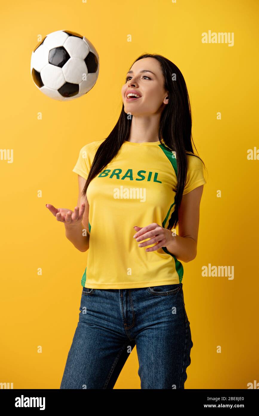 Girl throwing soccer ball hires stock photography and images Alamy