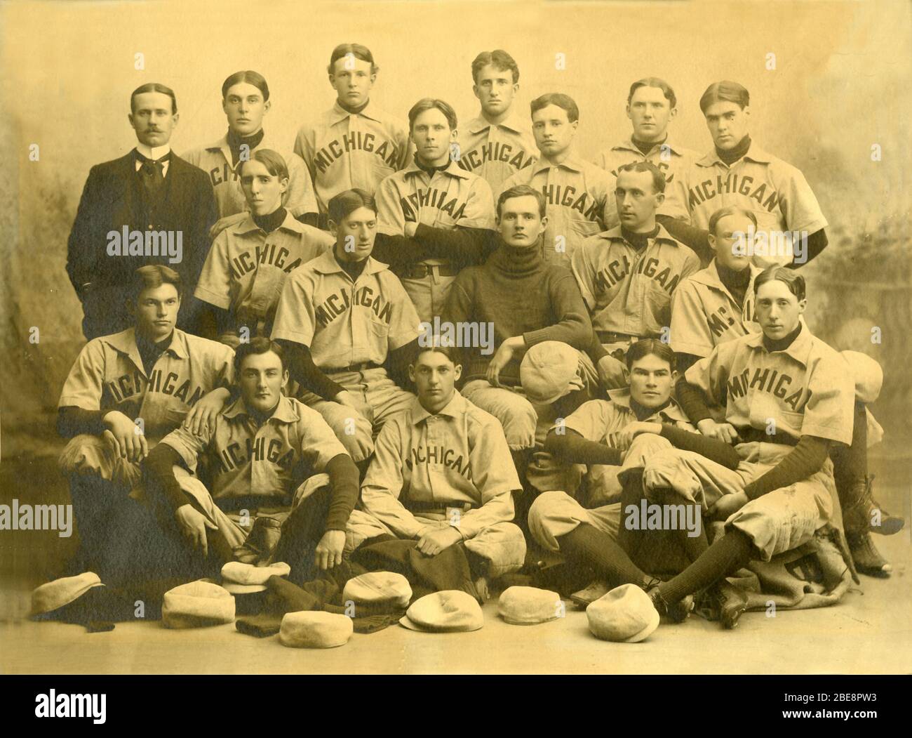 'English: Team portrait of the 1897 University of Michigan baseball team from the 1898 Michiganensian.Back row: mngr. Alatua Atkinson, Oliver A. Ludlow, Harry S. McGee, Chalres F. Watkins, Clifford B. Anderson, Edward F. Wehrle, J.R. Sheehan, Corydon F. HeardMiddle row: Theron M. Sawyer, Frank C. Condon, captain Guy A. Miller, Francis McMurray, Albert H. KeithFront row: Guy W. Lunn, Will E. Sullivan, E.L. Cooley, John E. Butler, Joseph N. Cartwright; 1897; Bentley Historical Library http://quod.lib.umich.edu/b/bhl/x-bbt1897/BBT1897?back=back1337990250;lasttype=boolean;lastview=thumbnail;med=1; Stock Photo