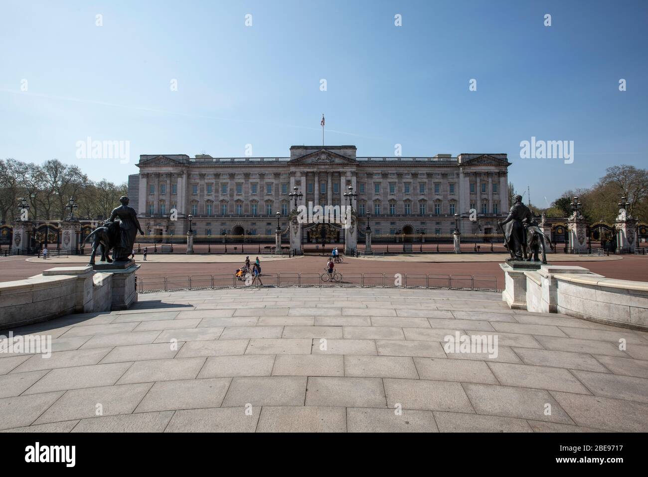 Empty pavements around Buckingham Palace during Easter Bank holiday as the coronavirus lockdown continues in central London and across United Kingdom. Stock Photo