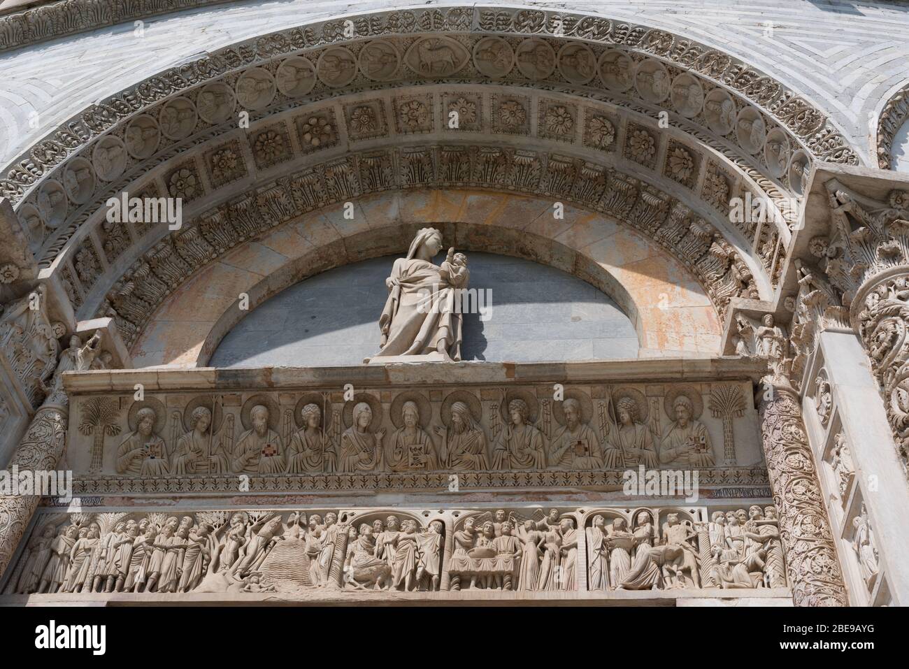 Details of the exterior of the Pisa Baptistery of St. John, the largest baptistery in Italy, in the Square of Miracles Piazza dei Miracoli , Pisa Stock Photo