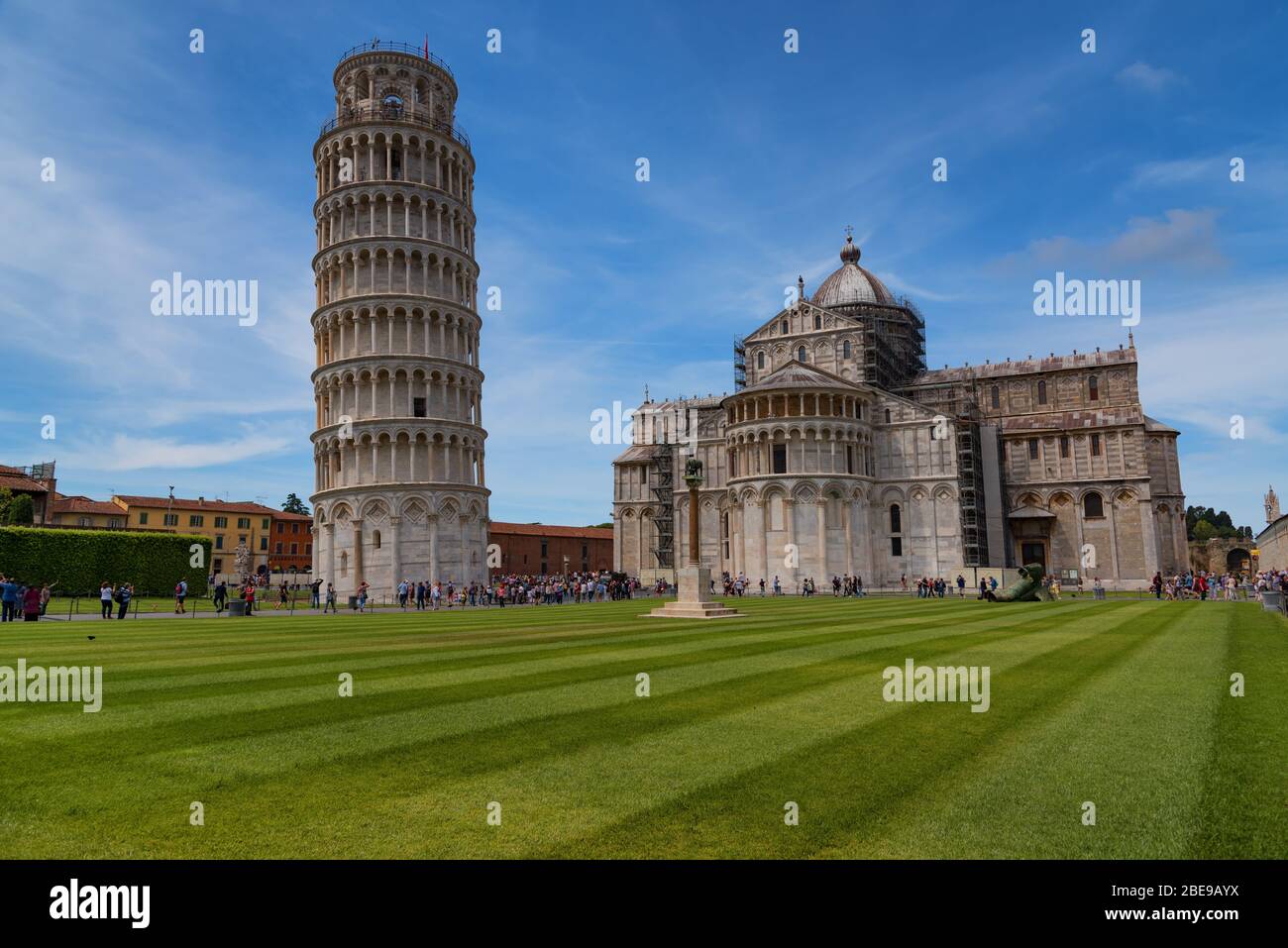 Stunning daily view at the Pisa Baptistery, the Pisa Cathedral and the Tower of Pisa. They are located in the Piazza dei Miracoli Square of Miracles Stock Photo