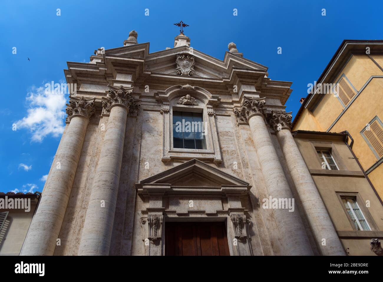 Architectural exterior of church in Siena, Italy Stock Photo