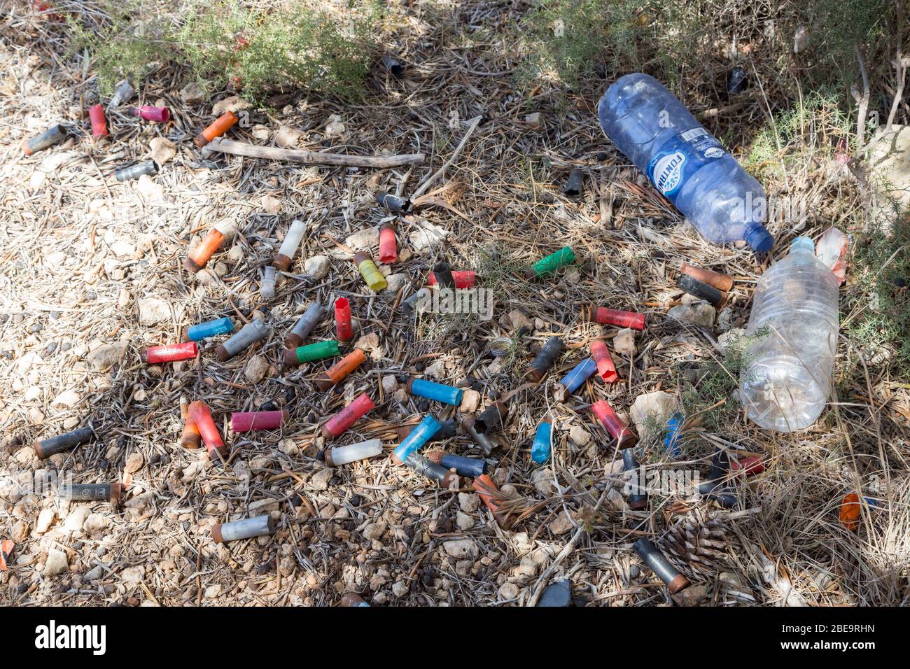 Litter including gun cartridges left by hunters in countryside, Xemxija