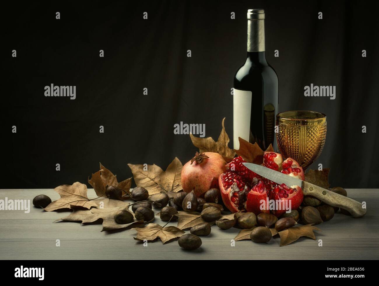 Top view pomegranate wine, bottle opener and fruit Stock Photo - Alamy