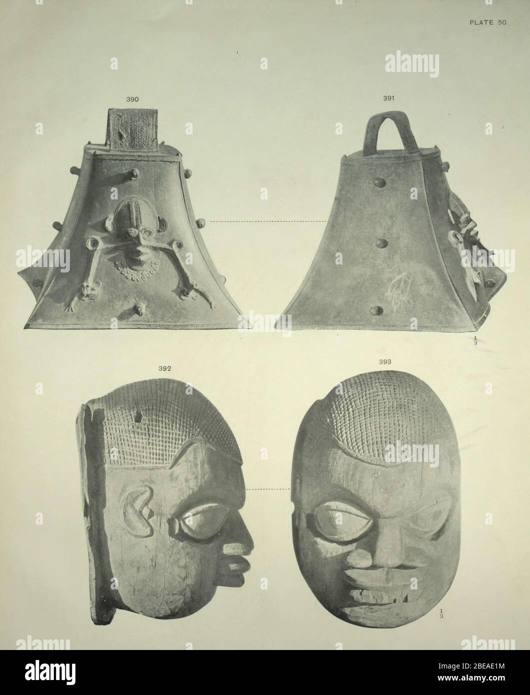 'English: DESCRIPTION OF PLATE L. Figs. 390 and 391.--Large metal bell. On one side is a human face in relief, with snakes issuing from the nostrils. Each of the two snakes grasps a mud or cat fish in its jaws. The ears project from the sides of the head-dress, and the neck has a frill consisting of a double row of perforated circles. The handle has an incised herring-bone ornamentation. Projecting from the sides of the bell are eight knobs. The base and crown of the bell have a border of strap-work pattern. Height of bell, 10 inches. Figs. 392 and 393.--Carved wooden head, which may have been Stock Photo