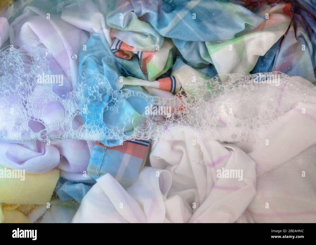 Closeup on laundry being washed in a washing machine Stock Photo Alamy