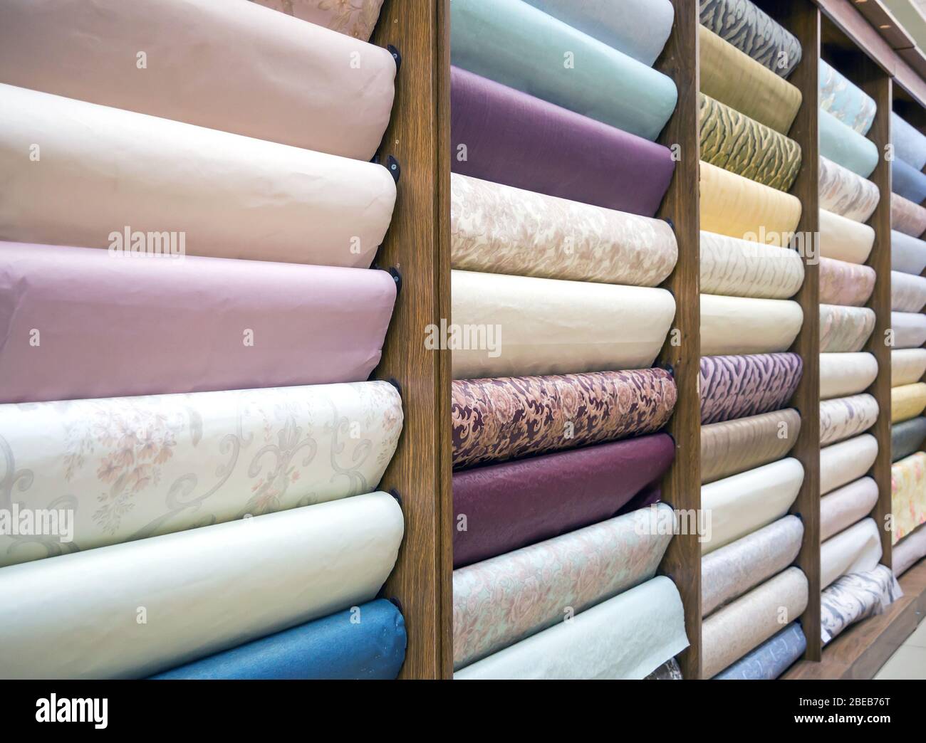 Samples of different wallpapers on store window racks Stock Photo - Alamy
