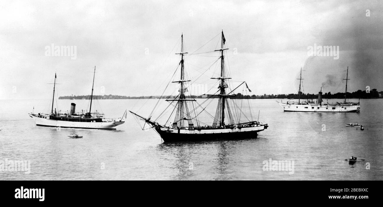 'English: Brig Niagara, 1913, LOC. Oliver Perry's flagship the Niagara and two other ships in Put-in-Bay Harbor, Lake Erie during her stay 20-25th July 1913. She was accompanied by a fleet of representatibe naval milita ships of the Great Lakes and United States revenue cutters.[1] Edit of Image:Brig Niagara 1913 LOC 3c27683u.jpg for WP:FPC; July 1913   12 October 2007 (according to Exif data); https://www.loc.gov/pictures/item/2001695540/; Library of Congress Prints and Photographs Division; ' Stock Photo