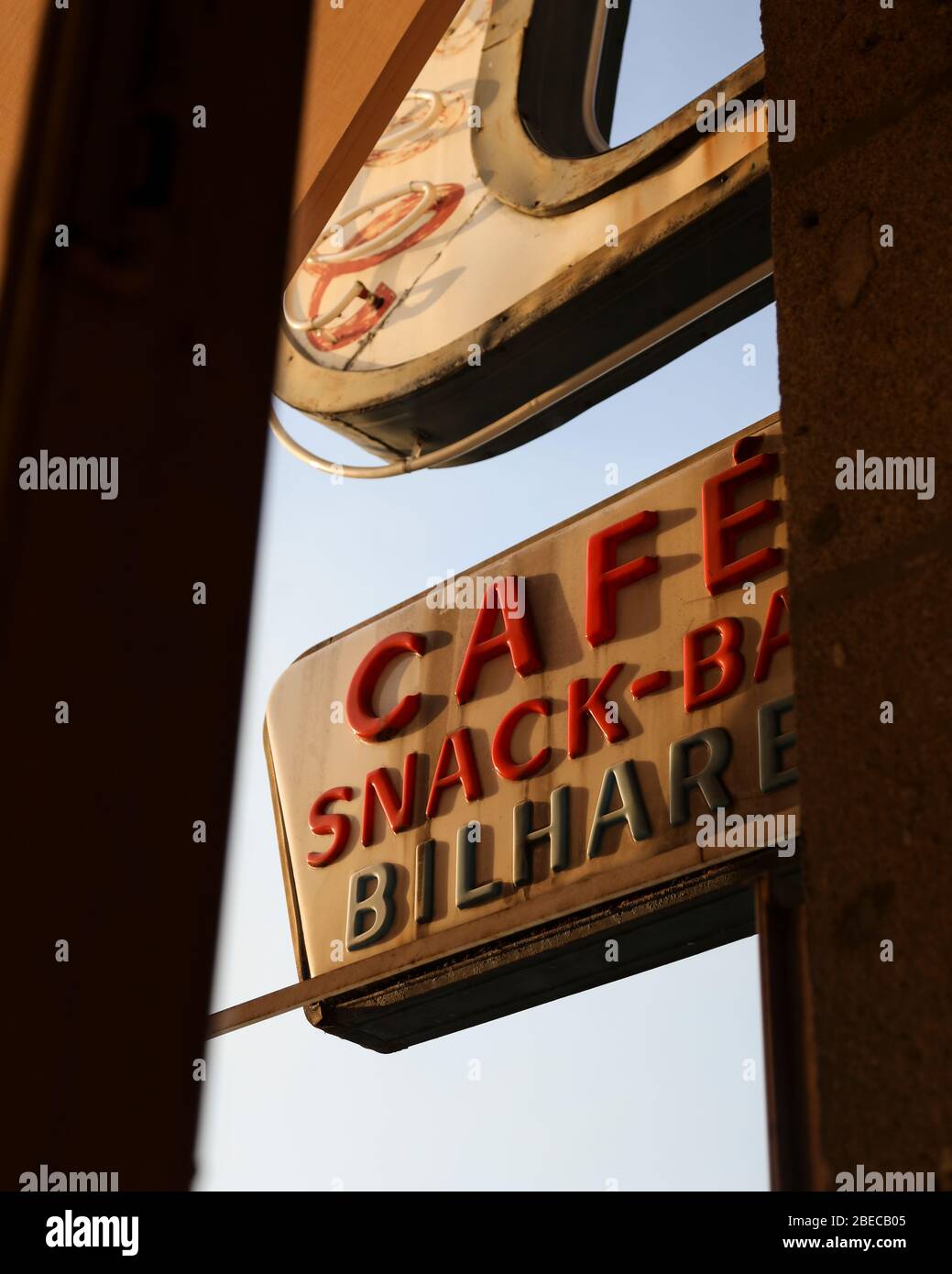 An obscured view of a retro sign for a Cafe, Snack Bar, in Guimarães, northern Portugal. Stock Photo