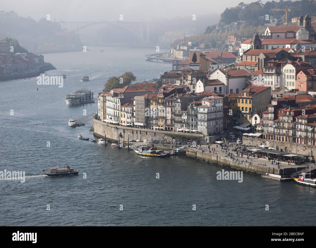 A view of the Douro River out to the estuary and the Old town from Dom Luís I Bridge in Porto, the second-largest city in Portugal. Stock Photo