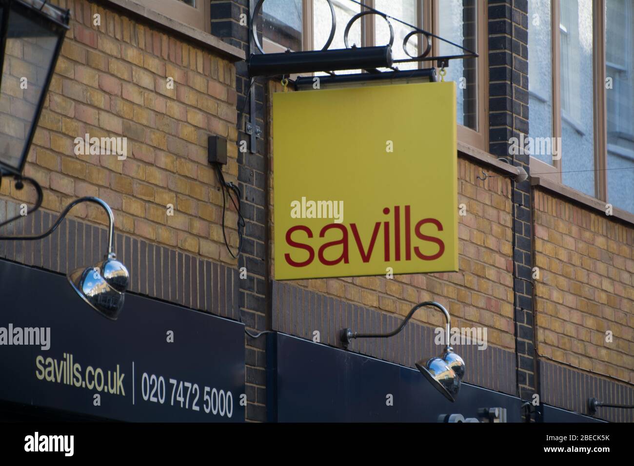 London- Savills estate agent exterior sign Stock Photo