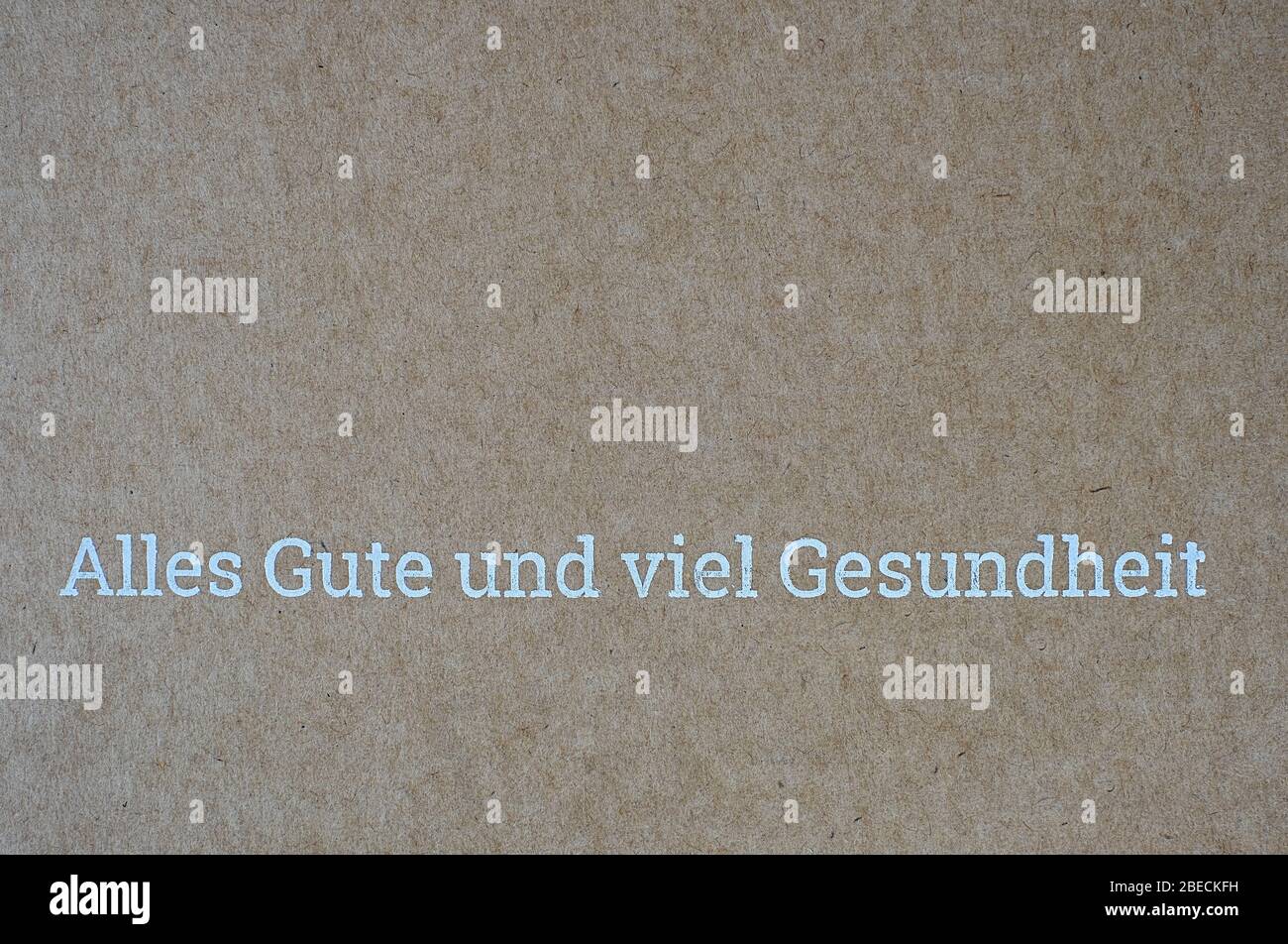 good wishes on cardboard in german language, Alles Gute und viel Gesundheit, in english, all the best and good health Stock Photo