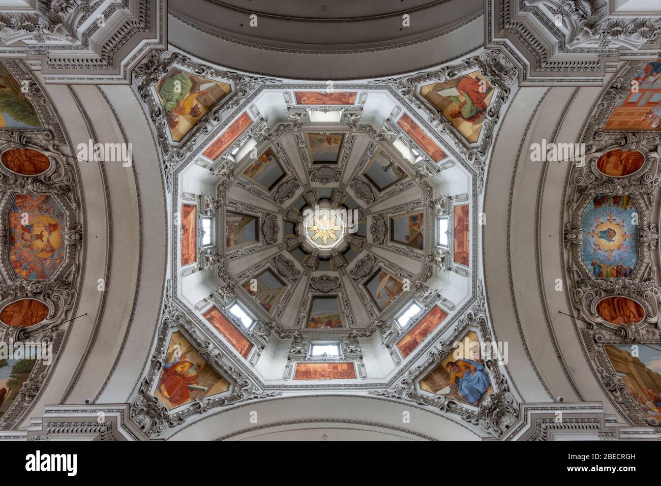 View looking straight up at the stunning ceiling of the main nave and dome inside Salzburg Cathedral (Dom zu Salzburg), Salzburg, Austria. Stock Photo