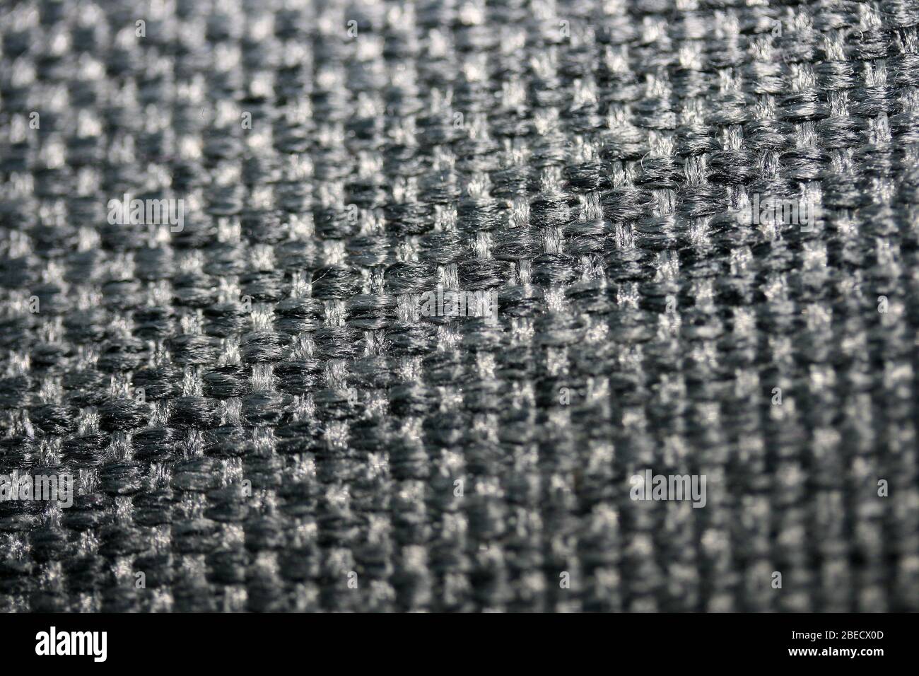 crosswise woven black fabric (synthetic fiber) überkreuz gewebter schwarzer  Stoff (Synthetische Faser Stock Photo - Alamy