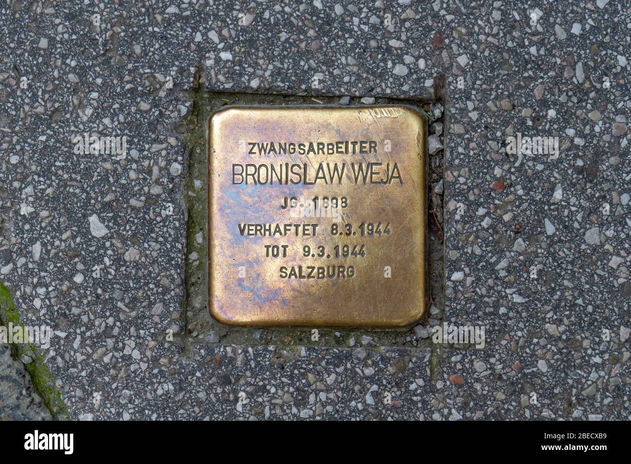 'Stumbling stone' bronze marker in the pavement for Bronislaw Weja in Salzburg, Austria. Stock Photo