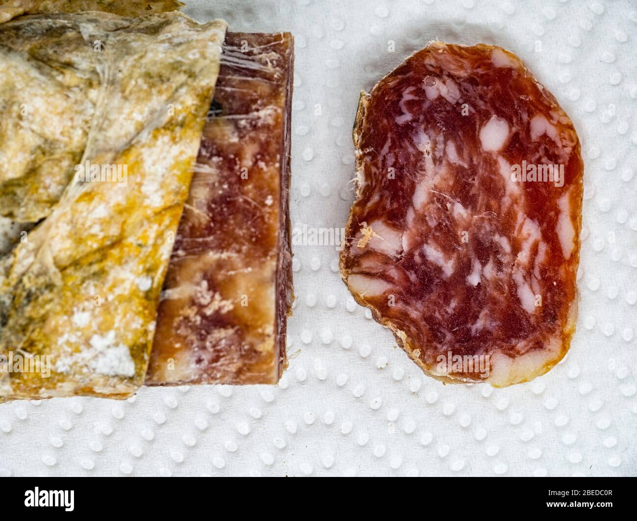 Slice of salami closeup Stock Photo Alamy