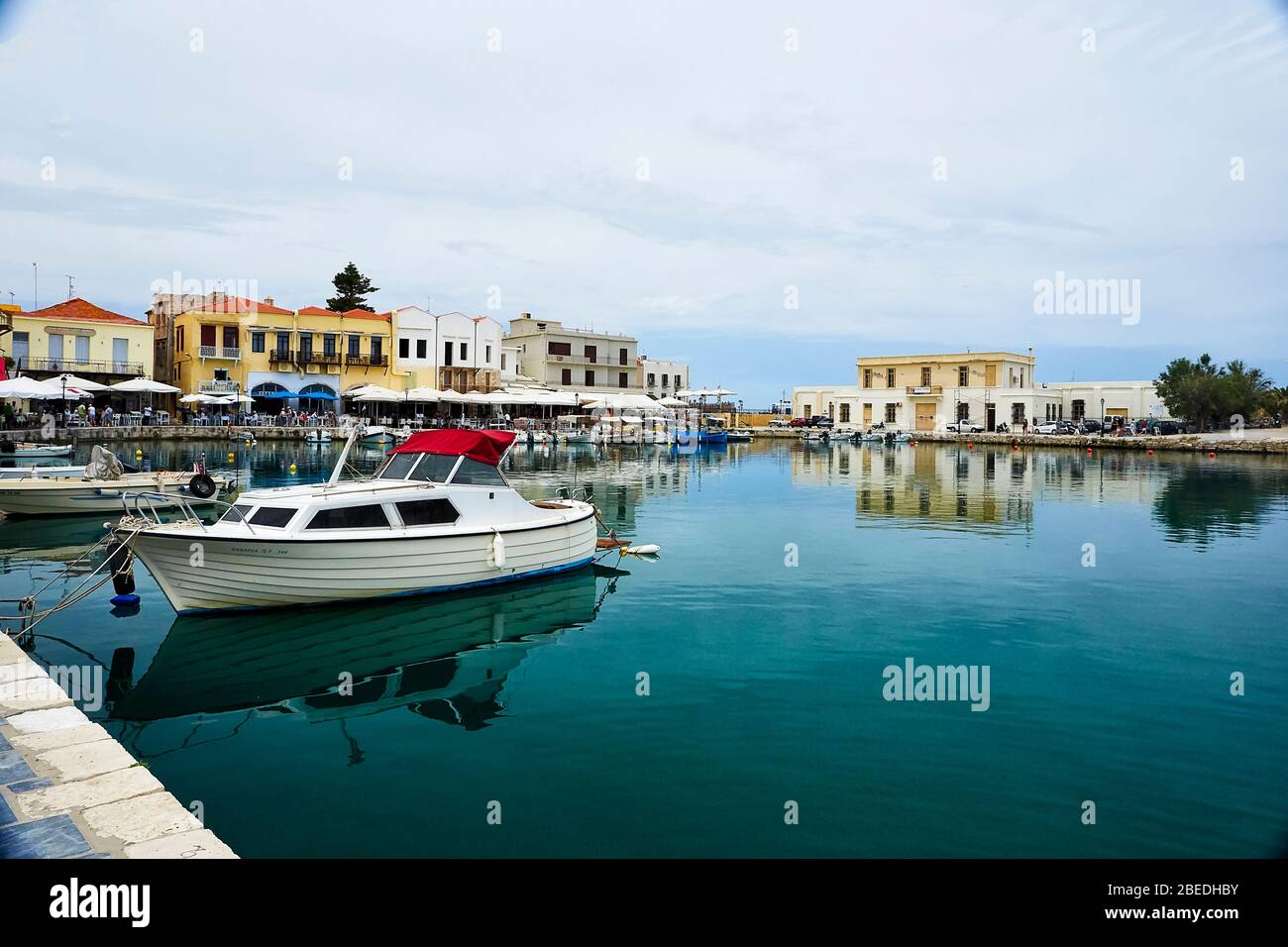 View at sea port of Rethymno, the Crete island, Greece. The town is famous for its venetian architecture and beautiful views. Stock Photo
