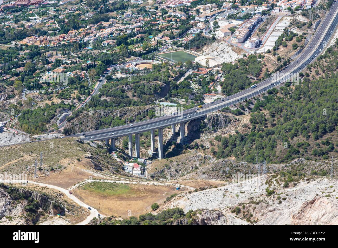 Aerial view of A-7, E-15 motorway.  Costa del Sol,  Malaga Province, Spain.  The town to the left is Arroyo de la Miel. Stock Photo