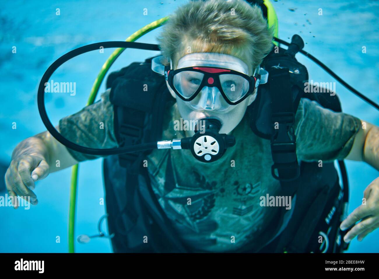 Young boy learning how to scuba dive in a pool Stock Photo Alamy