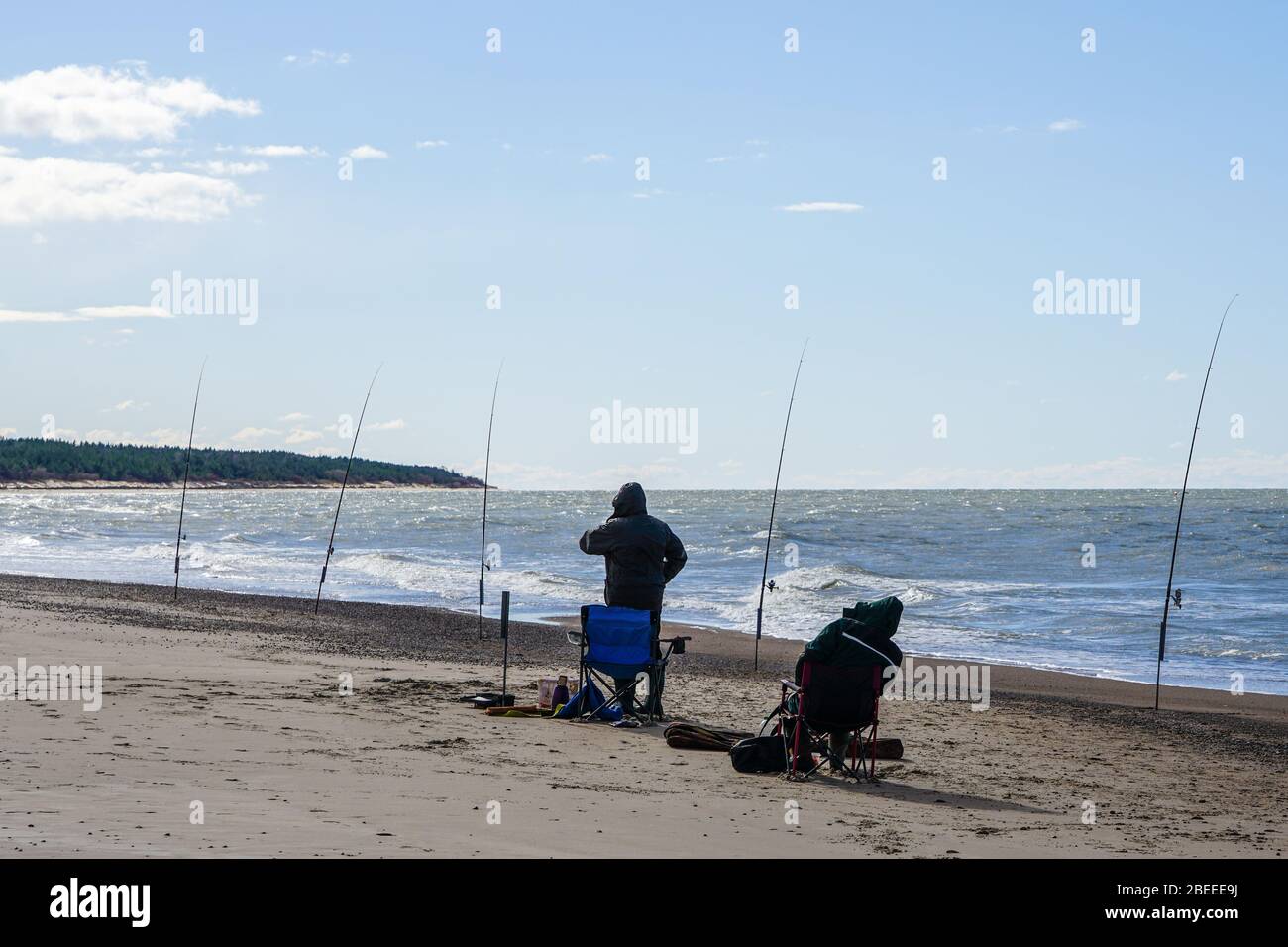 Two men catching fish hi-res stock photography and images - Alamy